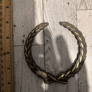 Cadillac Elegant Gold Wreath Emblem